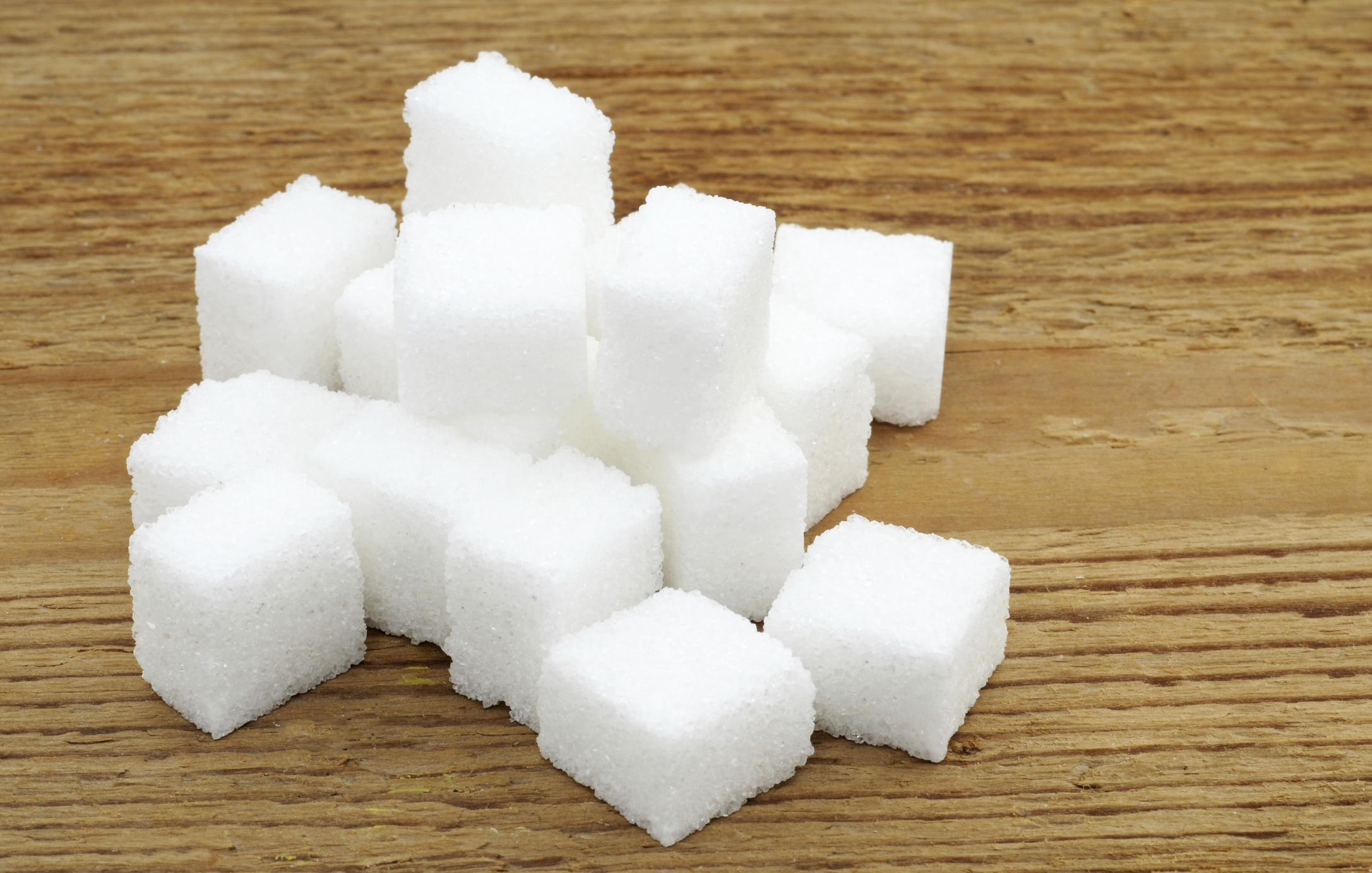 What Are the Pros & Cons of Sugar? Healthfully
