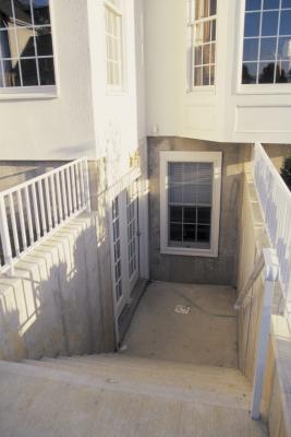 The wells around basement windows must be drained to prevent flooding.