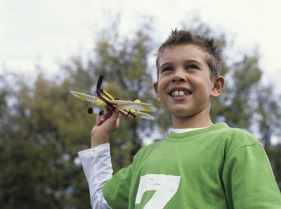 The electric Cox Micro Warbird is battery-powered.