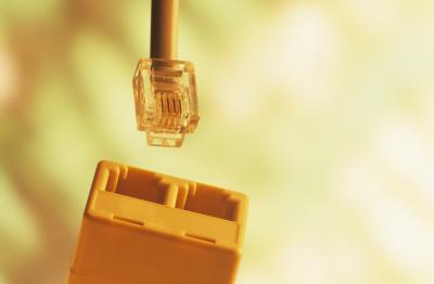 The standard phone plug will need to be modified to interface with a DIB.