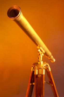 A refracting telescope ready to survey the night sky.