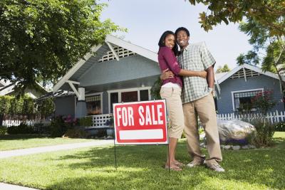 buying another house while owning one