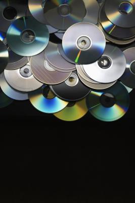 Holes punched in CDs indicate that the CD is a demo and should not be resold.