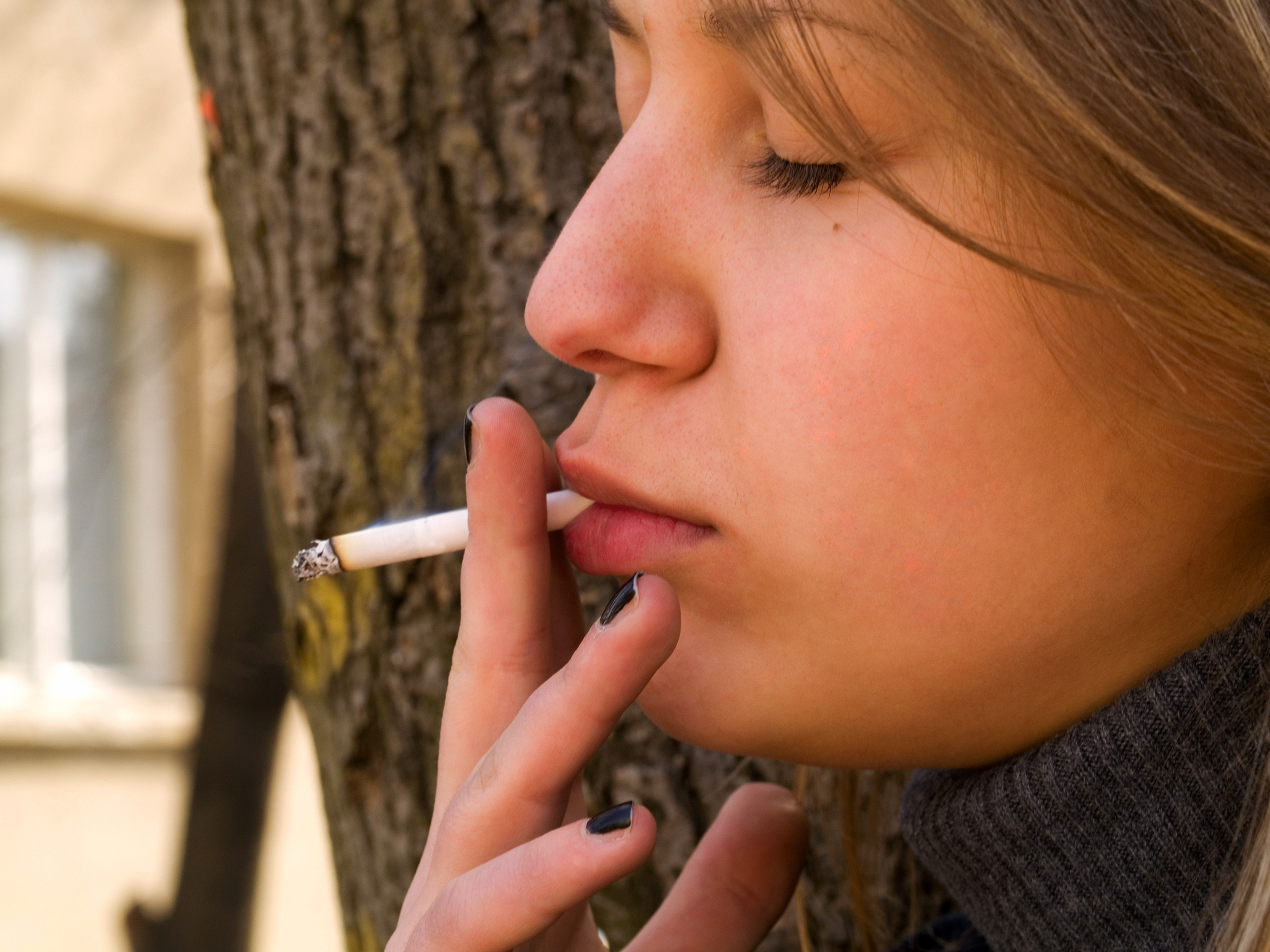 Teen giving smoking popping