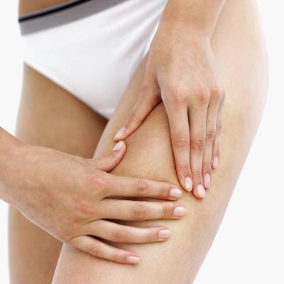 Upper Outer Thigh Muscle Pain From Running on a Treadmill - Woman