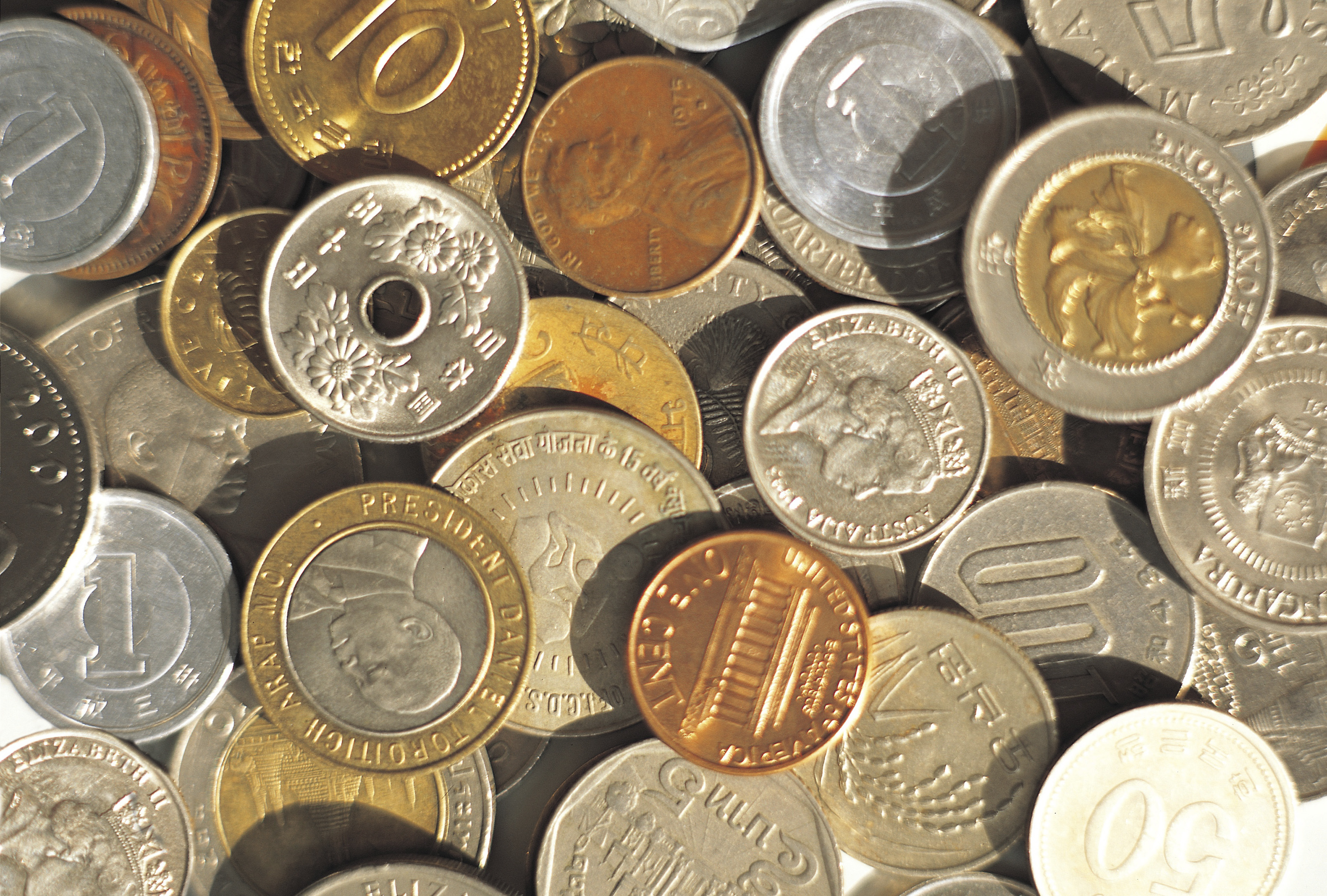 How to Cash in Foreign Coins | USA Today